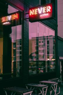 black and white glass window building by Randy Rizo courtesy of Unsplash.